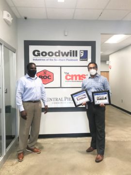 HEFL presents Goodwill with two awards for supporting construction projects with quality talent